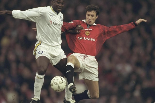 Tony Yeboah is challenged by Manchester United's Ronny Johnson during the Premier League match at Old Trafford in December 1996. The Red Devils won 1-0.