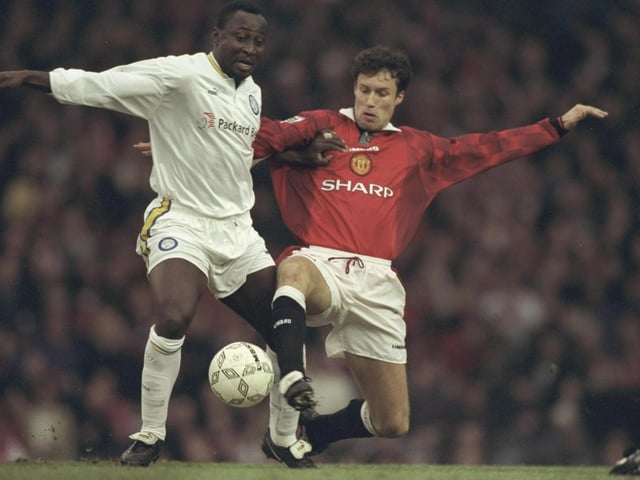 Tony Yeboah is challenged by Manchester United's Ronny Johnson during the Premier League match at Old Trafford in December 1996. The Red Devils won 1-0.