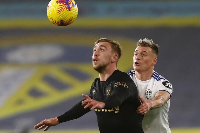 5 - Struggled to contain flying machine Jarrod Bowen. Got forward but the left flank was problematic in general for Leeds. Took a silly yellow card. Photo by JASON CAIRNDUFF/POOL/AFP via Getty Images.