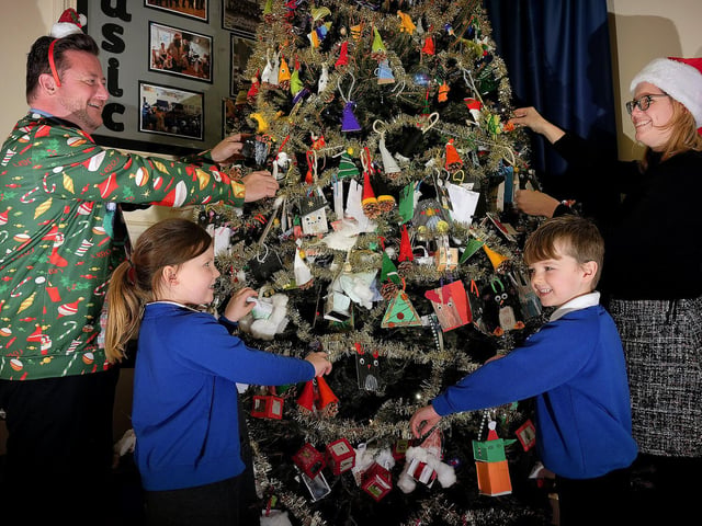 Headteacher Garry Johnson and Deputy Headteacher Vicky Gill with Annie and Freddie.