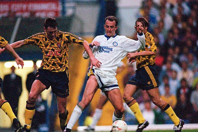 Gary McAllister battles with Arsenal's Andy Linighan during the First Division clash at Elland Road in September 1991. The Whites battled back to draw 2-2 with the Gunners.