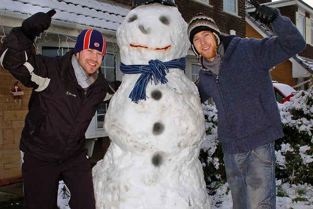 Andrew Ramsey (left) and Ben Reader with the giant snowman they built at Larkhome Parade, Fleetwood