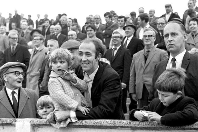 Wigan Athletic fans watching their team play Gainsborough Trinity at Springfield Park in 1970.