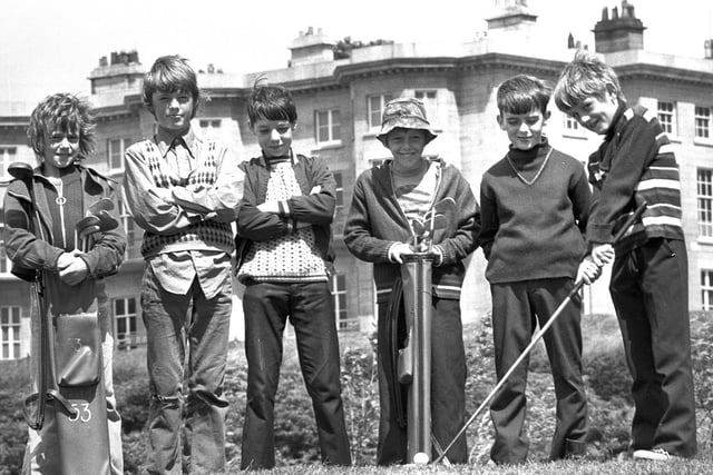 RETRO 1974  - Six pals take a swing at golf on Haigh Hall's course  during the summer holidays. The lads are pictured left to right Karl Slater, Stey Statter, Tony Sharples, Ady Boardman, Bri Sharples and Carl Statter.