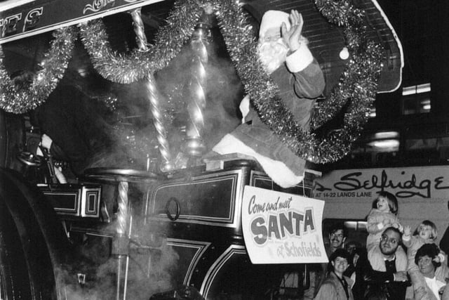 Father Christmas arrives aboard a 1920 Fowler showman's engine at department store Schofields in 1986.