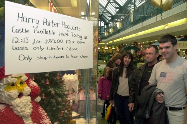 Christmas 2001 and a queue forms at Toymaster at The Headrow Centre which was selling the only Harry Potter Hogwarts Castle Lego kit in Leeds.