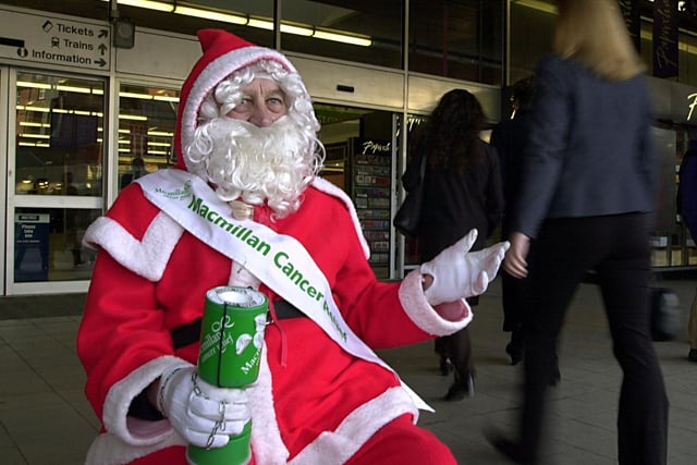 This is Harry Chaffer from Seacroft dressed as Father Christmas at Leeds City Station who was raising funds for Macmillan Nurses in 2001.