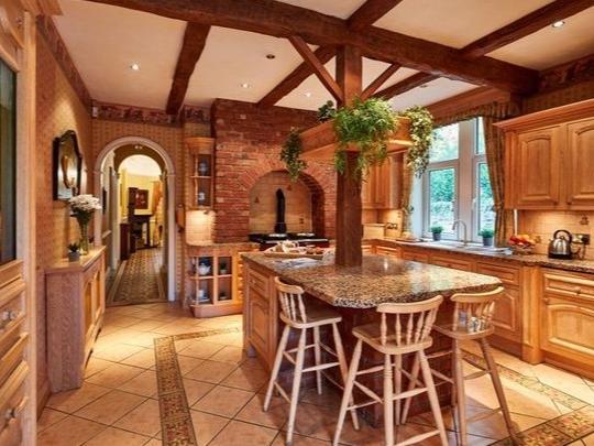 The large breakfast kitchen comes with a fitted aga.