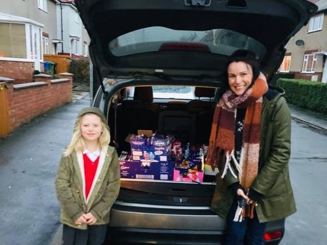 The Rainbow Centre receive their donation.