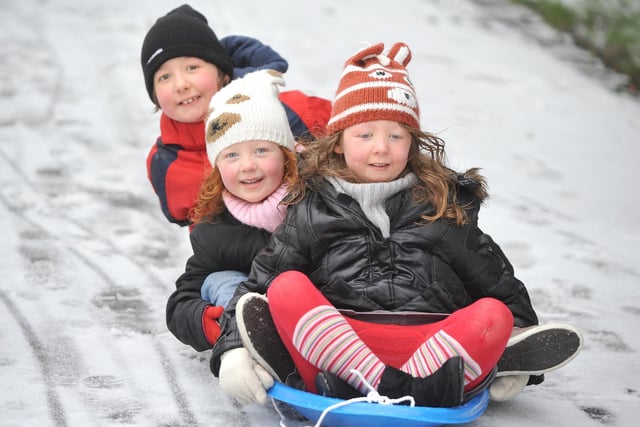 Jacob, Katie and Maggie Cox having fun in Mesnes Park, January 2012.