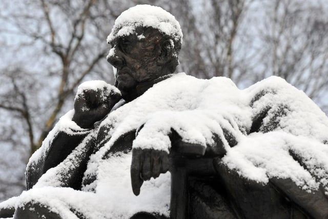Sir Francis Sharp Powell statue covered in snow in Mesnes Park, Wigan, January 2019.