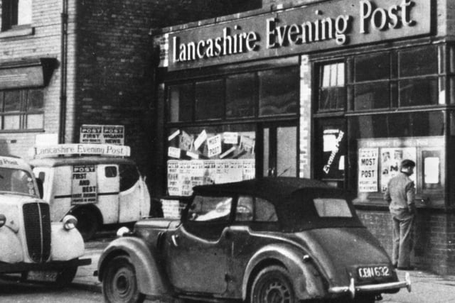 The Lancashire Evening Post newspaper office next to the Central Labour Club building, in the shadow of  Central Park RL ground, Wigan, in 1953