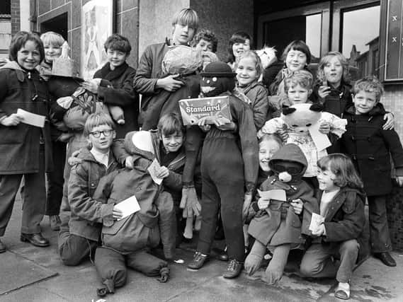 Wigan's ABC Cinema Minors Club gang with their home made bonfire Guy Fawkes in 1974