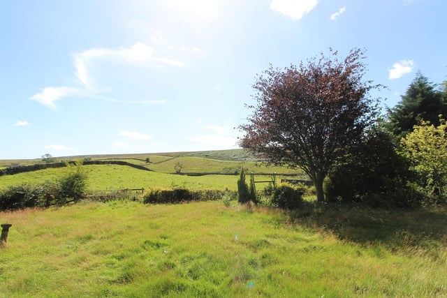 The property is located on the southern edge of the village, with open, uninterrupted views over the moor.