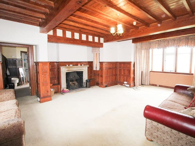 Wood panelling is a feature of the property