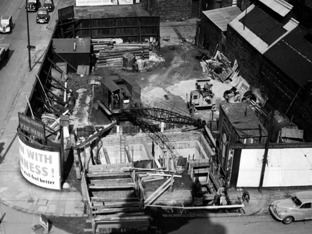 An elevated view of construction work on a sewage lift on Great Wilson Street by the junction with Meadow Lane. Pictured in April 1955.