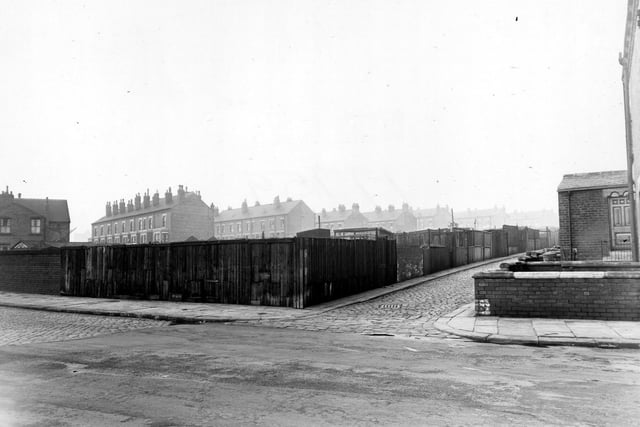 November 1950. View looking north along Back Cross Green Crescent from Cross Green Lane. Houses on the Fewston Estate can be seen on the other side of the railway line with the Glencoes in the far distance to the right.