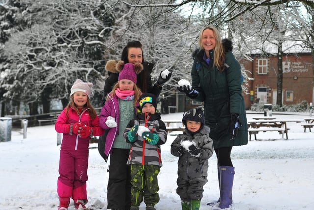 Hayley Dunn, left, and Stephanie White, right, with, from left, Millie, four, Layla, seven, Lochlan, three, and Jude, two, having fun in the snow at Haigh Woodland Park.