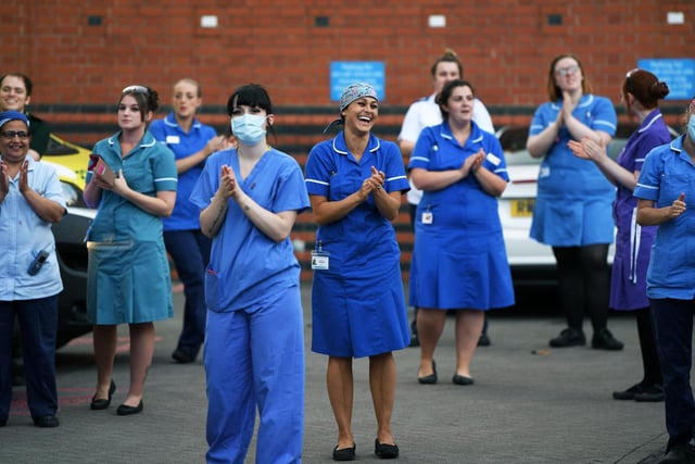 Staff at Leeds General Infirmary take part in Clap For Carers in May.