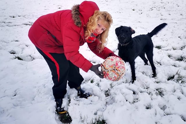 Jean Hensey-Reynard and dog Lottie enjoying the snow.