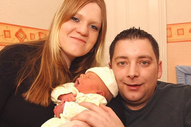 Leah Marie Mitchell, Christmas baby, and parents Darren Mitchell and Josy Vamplew.