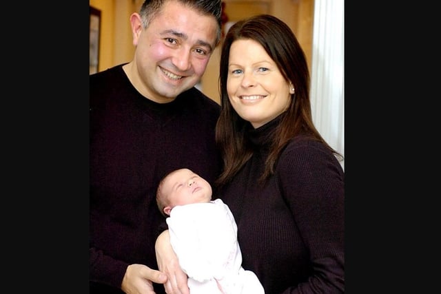 Maisy Grace Carr pictured with proud mum and dad, Leigh and Tony.