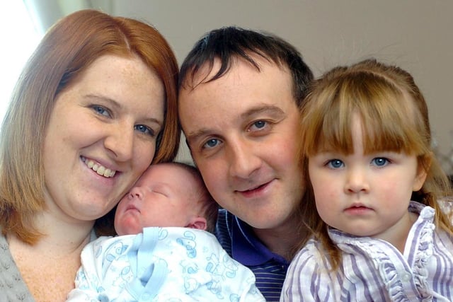 Joshua Paul Dean with mum Emma, dad Andy and sister Alicia.