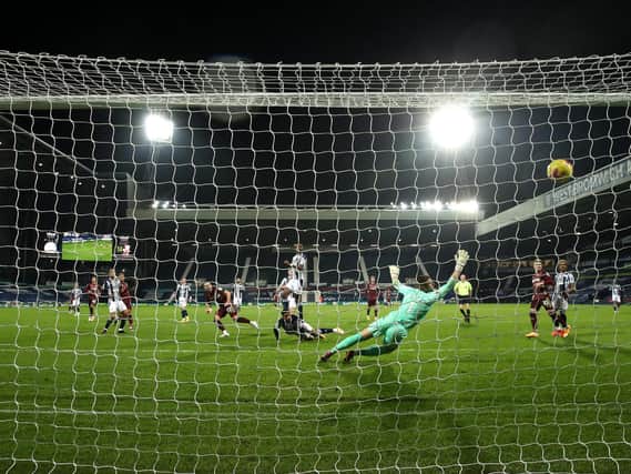 Jack Harrison fires past Baggies 'keeper Sam Johnstone to net Leeds United's third goal at The Hawthorns. Photo by David Rogers/Getty Images.