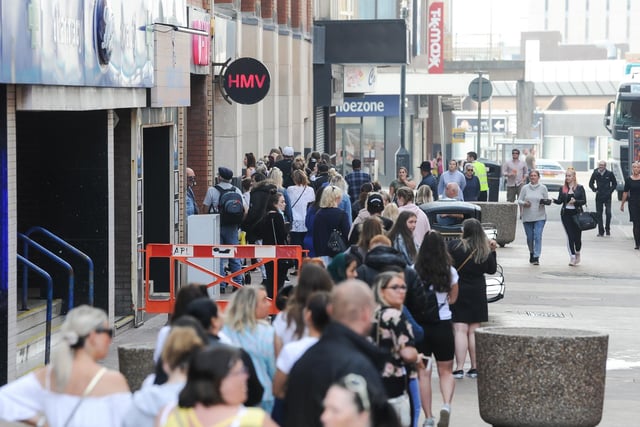 People queue for Primark on Bank Hey St as shops and businesses are allowed to reopen