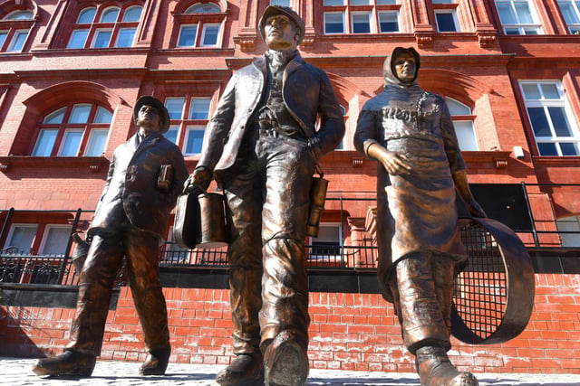 MARCH - After years of fund raising by Wigan Heritage and Mining Monument (WHAMM), they finally got the statue to commemorate Wigan's mining community, placed in the shadow of Wigan Town Hall, former Wigan Mining College.  The statue, created by sculptor Steve Winterburn, is of a man, woman and child has no base or plinth so that they appear to be walking on the cobbles, as a proud working-class family would have.  The highly anticipated unveiling ceremony had to be cancelled due to the coronavirus.