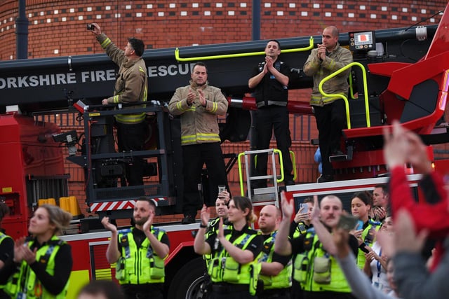 Police and firefighters pictured at Leeds General Infirmary, showing their support for NHS workers on the frontline of the pandemic during the Clap For Our Carers. People across Leeds took to their doorsteps, banging pots and pans and cheering the NHS heroes