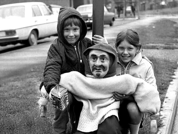 Youngsters collect a penny for the guy  in Wigan 1973