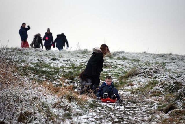 Families were quick to take to the hills with their sledges