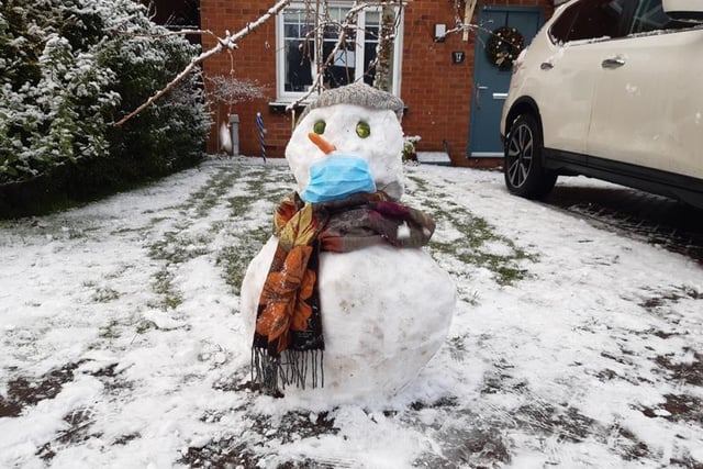 A sign of the times: A mask-wearing snowman in Buckshaw Village