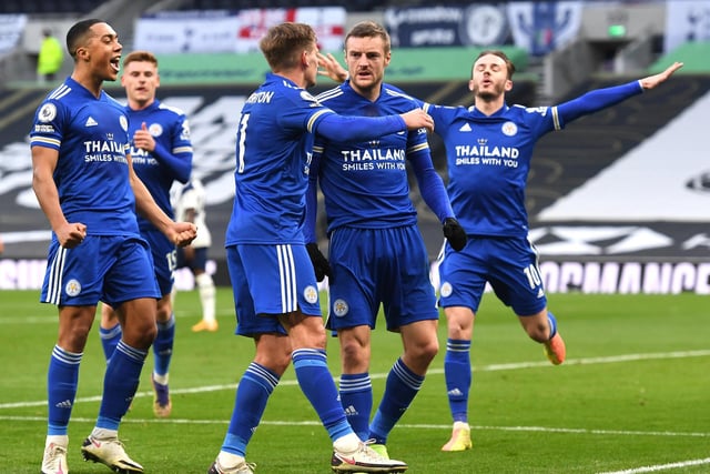 Jamie Vardy of Leicester City celebrates with team mates Youri Tielemans, Marc Albrighton and James Maddison after scoring their sides first goal during the Premier League match at the Tottenham Hotspur Stadium on December 20, 2020.