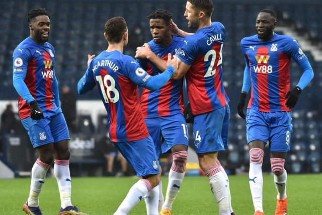 Wilfried Zaha of Crystal Palace celebrates with Gary Cahill and James McArthur after scoring during the Premier League match between West Bromwich Albion and Crystal Palace at The Hawthorns on December 06, 2020.