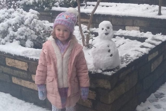 Eva Walton (three) built a snowman in Manchester Road,Burnley