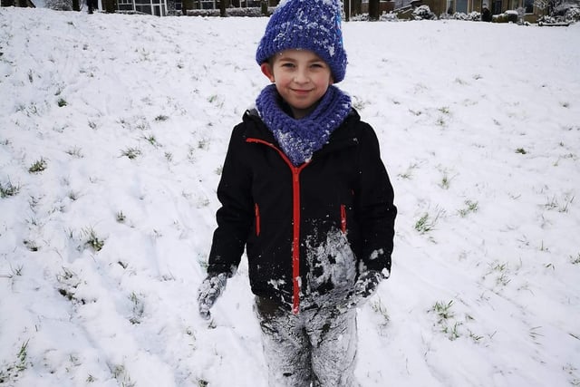 Scotty Crawford (eight) pictured enjoying the snow in Towneley Park, Burnley