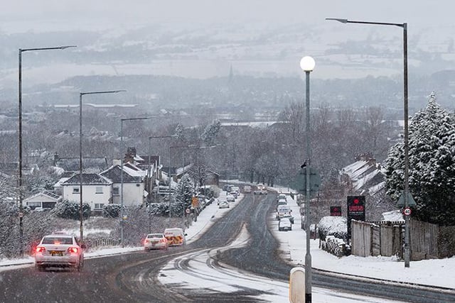 Rossendale Road as the snow falls once again