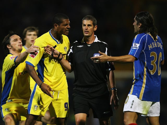 Jermaine Beckford argues with Pompey's Pedro Mendes during the Carling Cup second round clash at Fratton Park in August 2007.