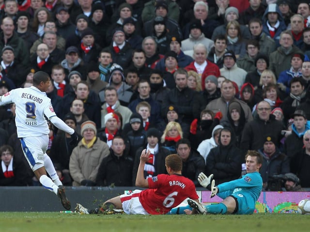 Manchester United goalkeeper Tomasz Kuszczak and defender Wes Brown are unable to stop Jermaine Beckford scoring during the FA Cup third round clash at Old Trafford in January 2010.
