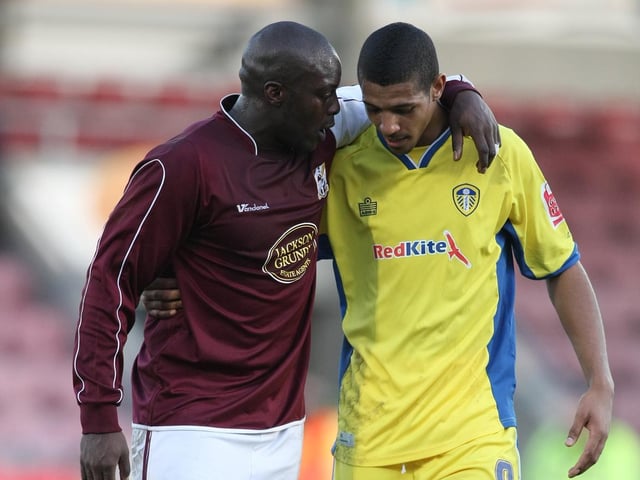 Northampton Town's Adebayo Akinfenwa talks to Jermaine Beckford at the end of the Coca Cola League One clash at the Sixfields Stadium in February 2008. The game finished 1-1 with Jonny Howson scoring for the Whites.