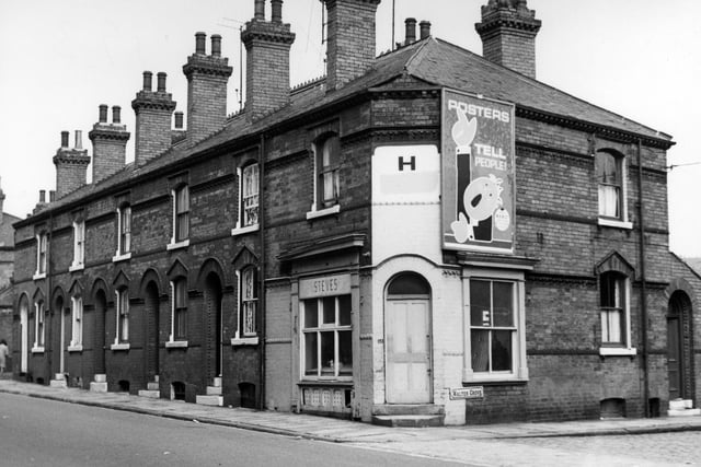 Cambridge Road in August 1967 featuring a shop, with a window on Walker Grove. This was once a butchers shop, seen here with the name 'Steves'.