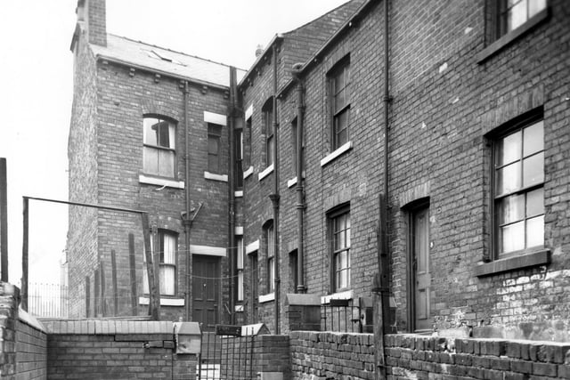 A view of Back Pleasant Dairy in November 1964. These were through houses which had entrances on Ella Street.