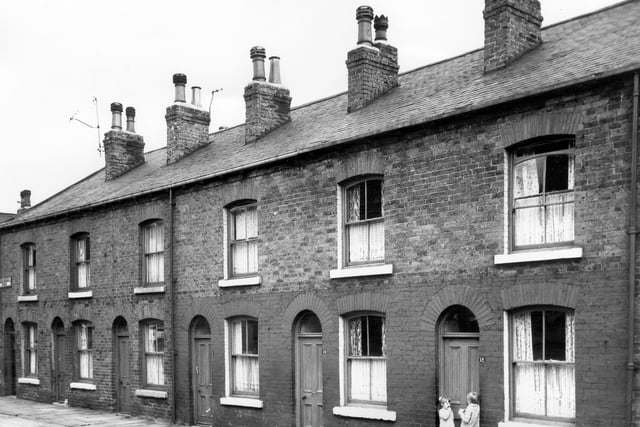 August 1965 and pictured is through properties on Cross Speedwell Street which also had frontage on Speedwell View. The Speedwell street names refer to a healing well or spa which had existed in this area at one time.