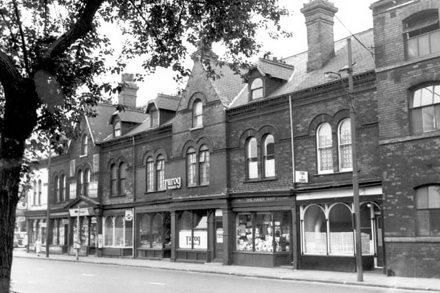 August 1967 and this looks from the front of Meanwood Road swimming baths. On the left edge is an off licence business of Edward Moran. Moving right there was a newsagents, then a shop and bakery, and a ladies and childrens clothes shop. A fish and chip shop had been the business of Bellwoods.
