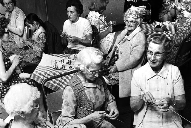 Members of Ashton knitting group begin their sponsored knit for charity in 1973