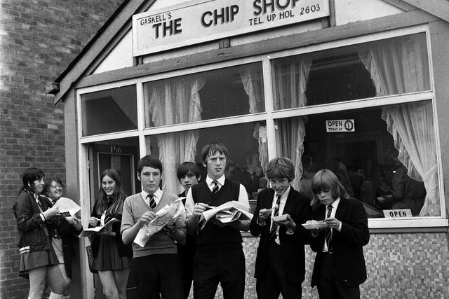 Up Holland High School pupils chips at Gaskell's chippy in Orrell in 1971