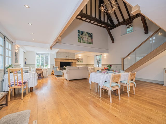 The magnificent galleried guests dining room