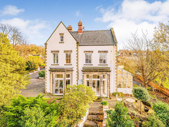 The house is set within beautiful grounds